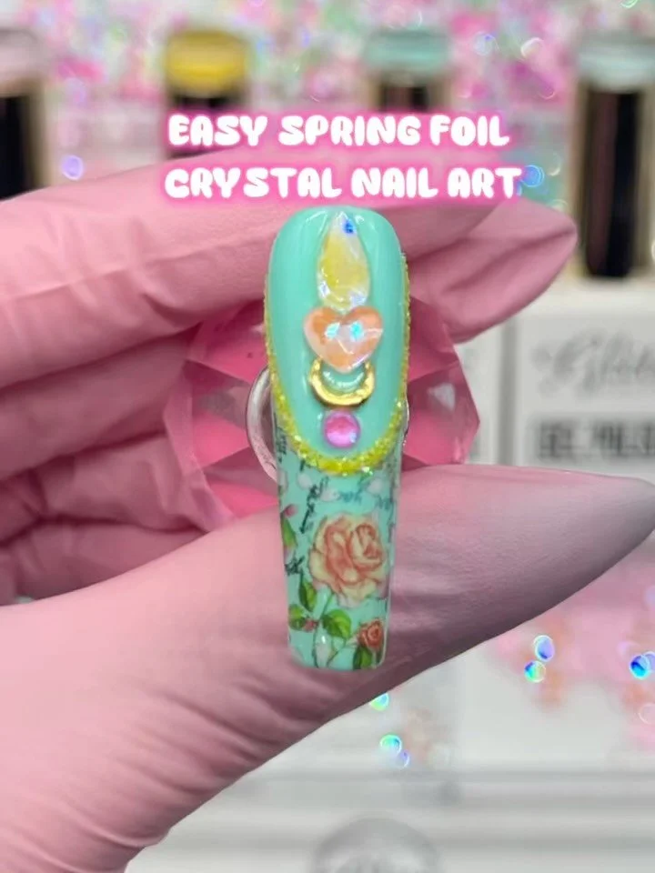 🌸 BEGINNER NAIL TECHS&hellip; stop overworking your Spring sets 👀💐

This entire luxury design was created using foil + crystal placement &mdash; no hand painting needed.

✨ Faster service
✨ Higher pricing
✨ Luxury results

Clients don&rsquo;t pay 