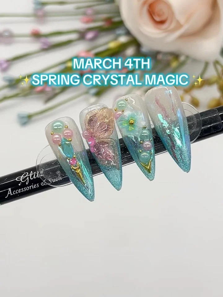 SPRING CRYSTAL MAGIC ✨💎
Soft ocean shimmer, dreamy butterflies, and luxury crystal accents&hellip; this set is giving spring fairy garden meets luxury nail tech artistry.

The secret to this look? Layering shimmer, foil, and crystals so even beginne