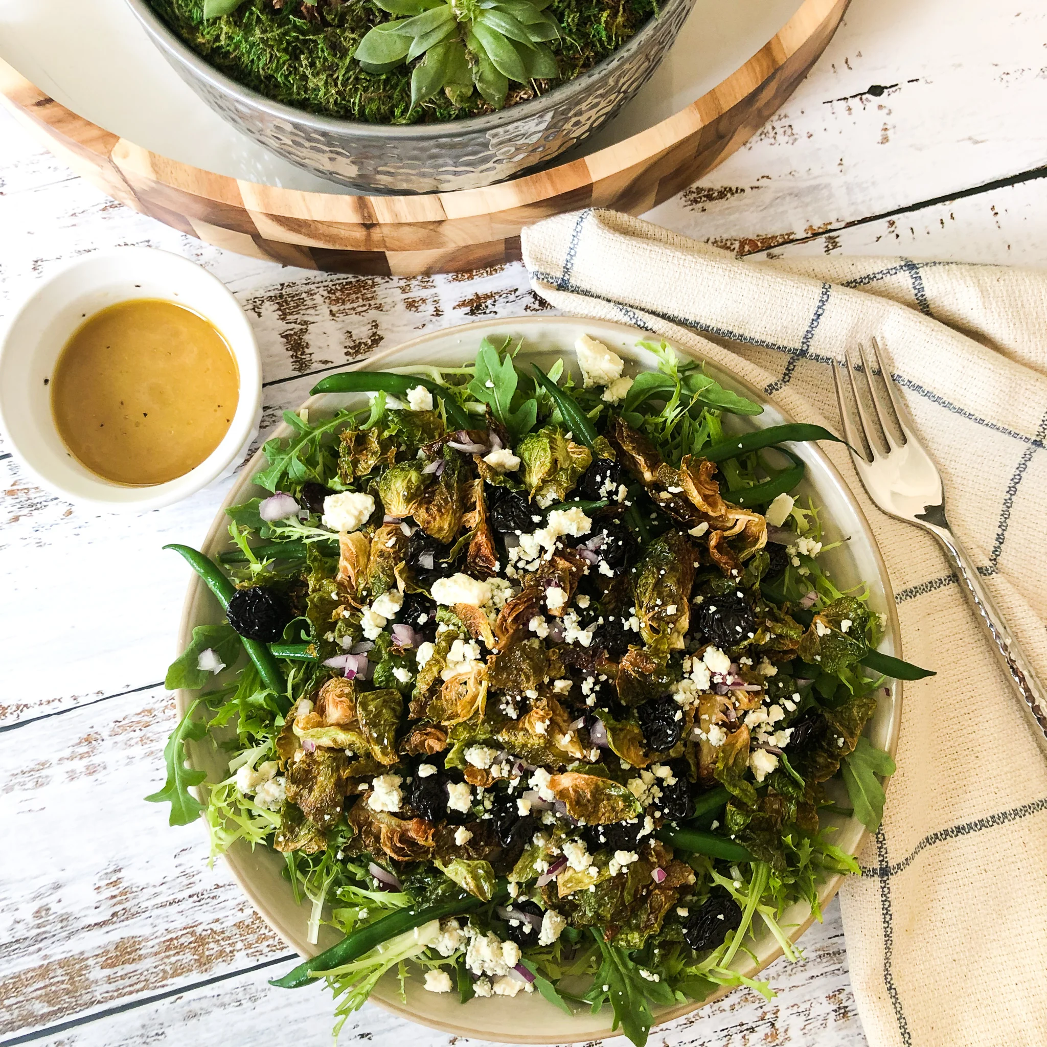 crispy brussel sprout salad with maple dressing