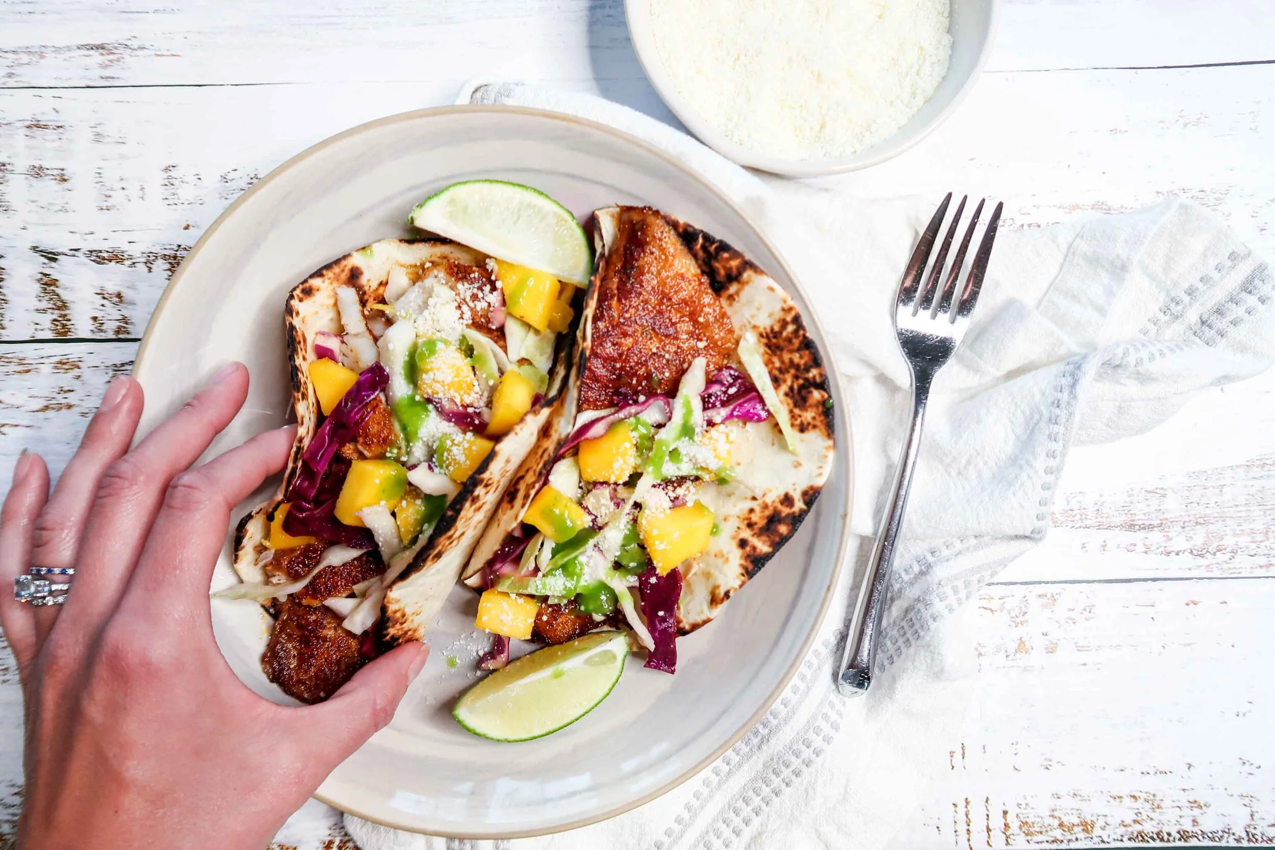 blackened fish tacos with mango cabbage slaw