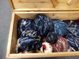 Box of salvage wool to choose from