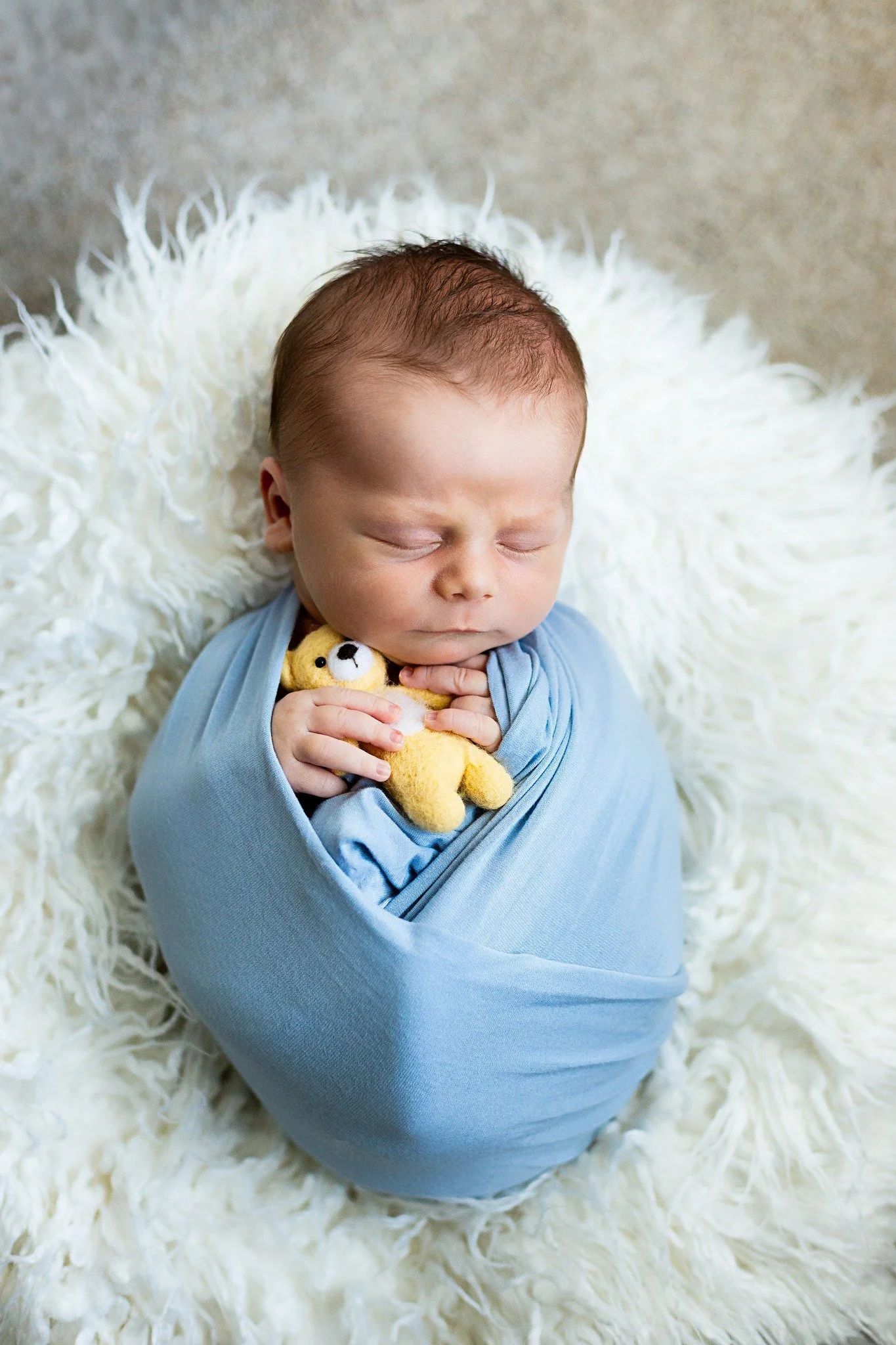 This photo needed a spotlight all on its own! How precious is baby Rowan? 🩵