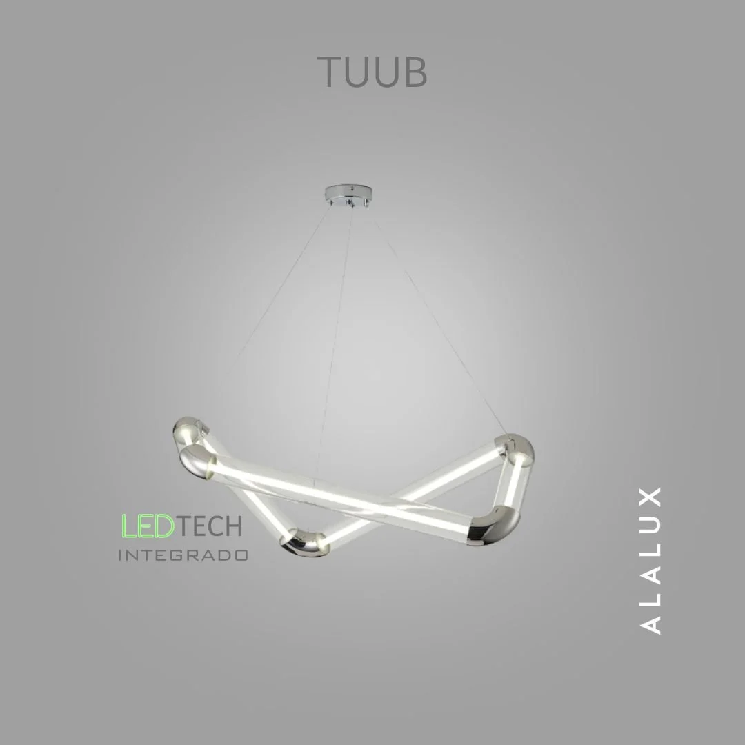 Tuub é um pendente que une arte luminosa e arquitetura contemporânea em uma peça escultural de tubos translúcidos e curvas metalizadas, criando um movimento fluido que parece suspenso no ar.