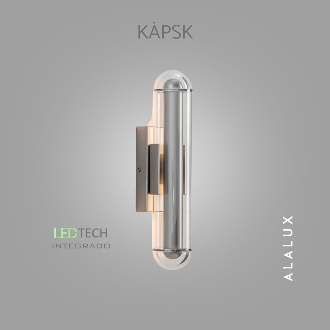  Käpsk é uma arandela que traduz o encontro entre   design contemporâneo, iluminação decorativa e sofisticação arquitetônica. Sua luz cria um halo quente e envolvente que se espalha suavemente pela parede, revelando uma atmosfera acolhedora e elegant