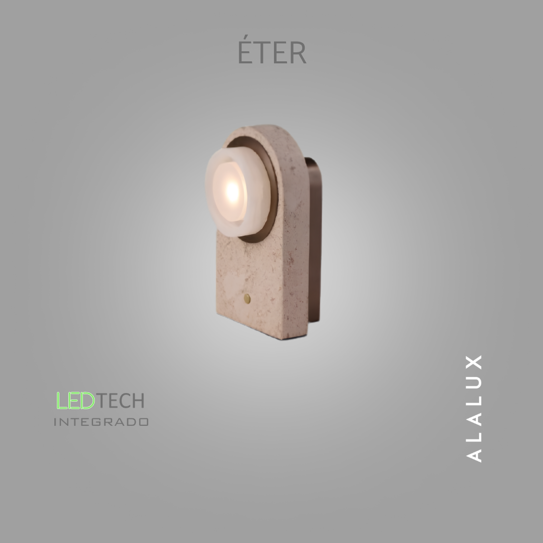  A  Arandela Éter  traduz a essência do design contemporâneo ao unir formas orgânicas, materiais nobres e tecnologia em uma peça de presença marcante. Seu elegante acabamento em  mármore travertino  confere autenticidade e exclusividade, revelando ve