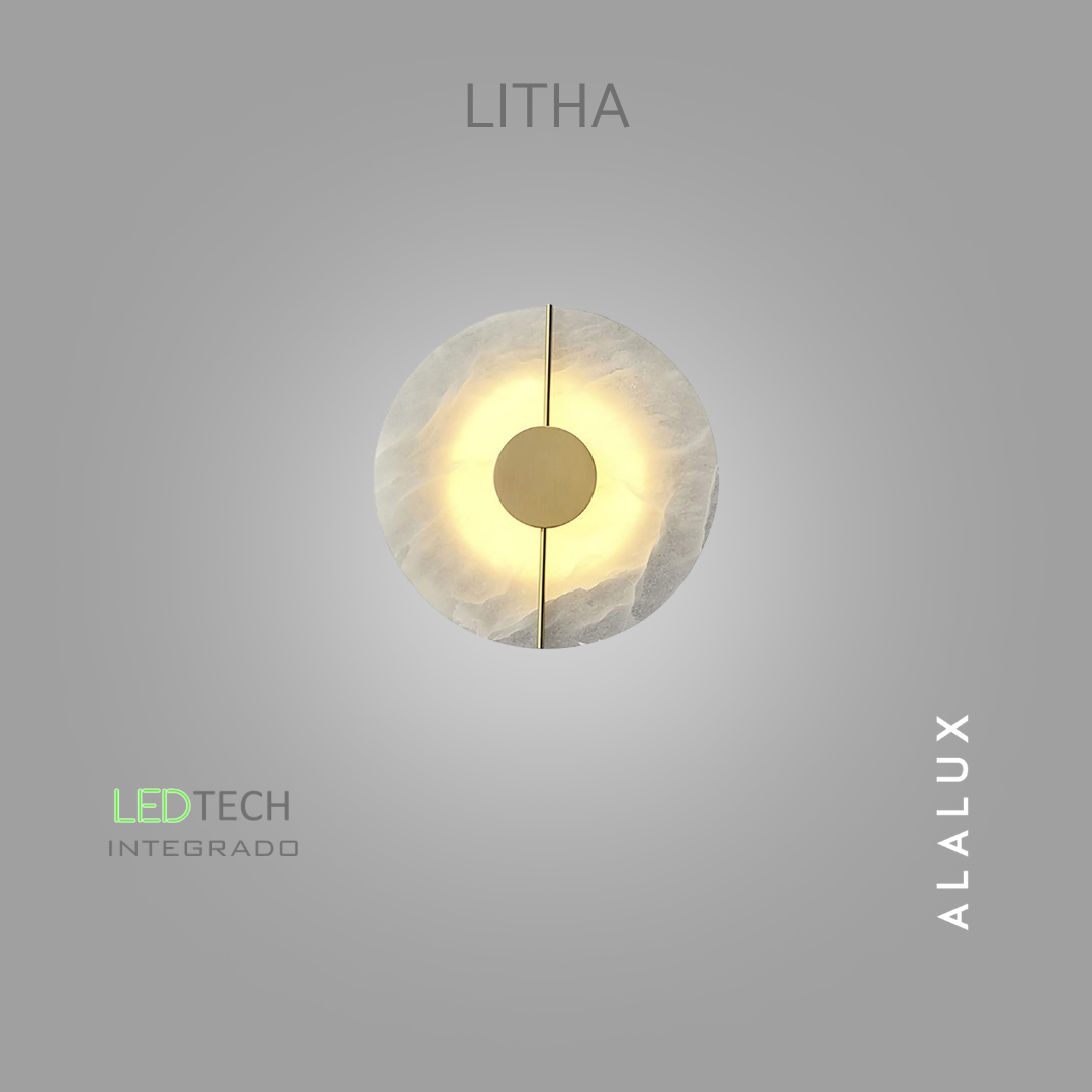  A LITHA reúne materiais naturais, tecnologia e design em uma peça de iluminação autoral de forte presença estética. Seu corpo circular em mármore apresenta uma composição minimalista, complementada por um elemento metálico central que atravessa vert