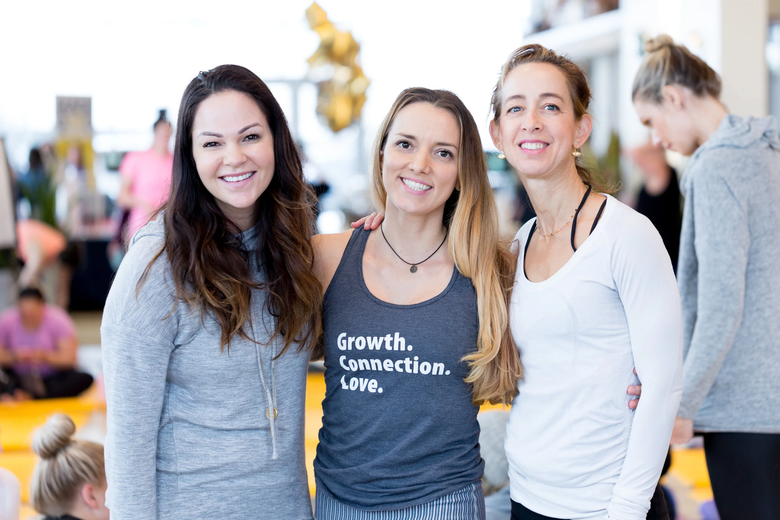 Yoga instructors Katie Miller, Danielle Jokinen and Jes Rosenberg.