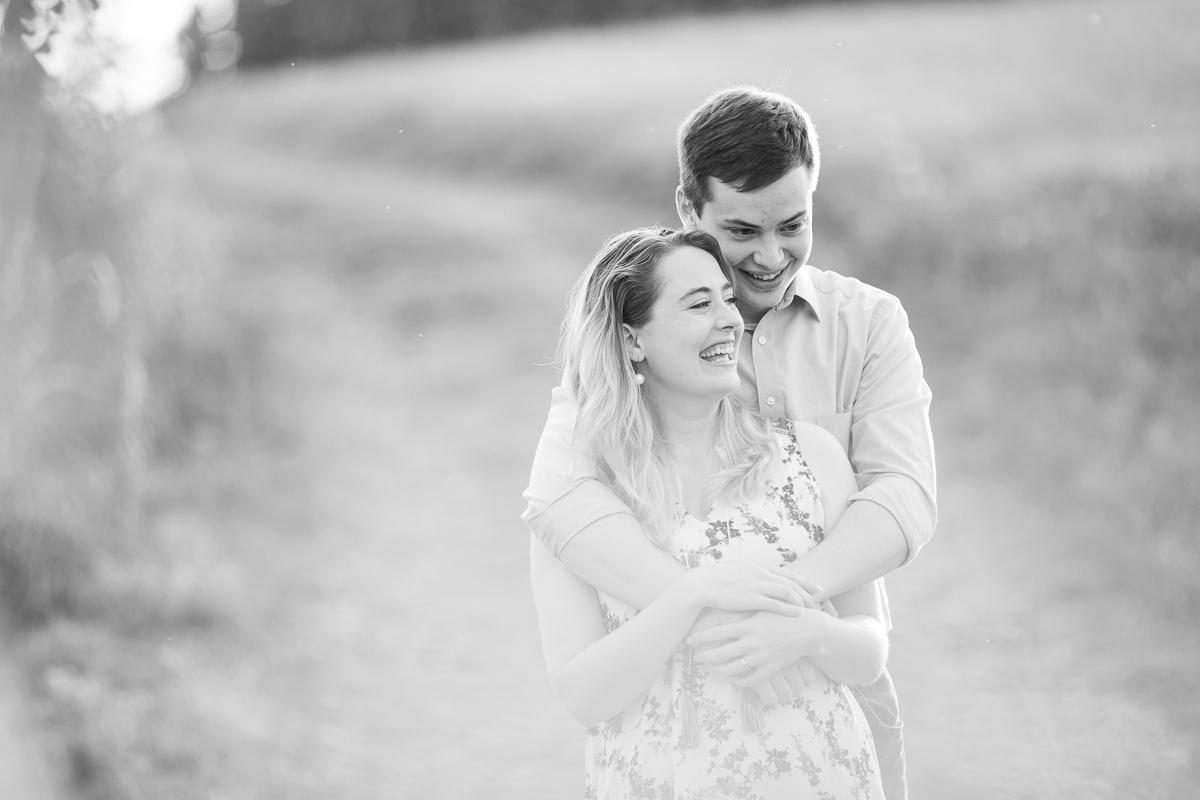 Black and white sunset engagement session photo.