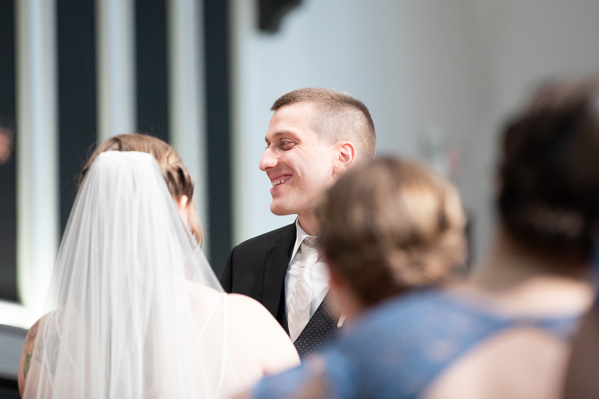 Groom during ceremony.