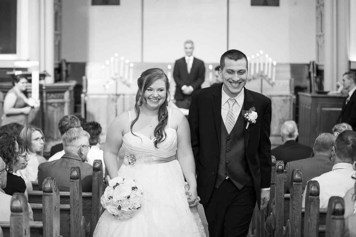 Bride and groom announced and leaving ceremony. 