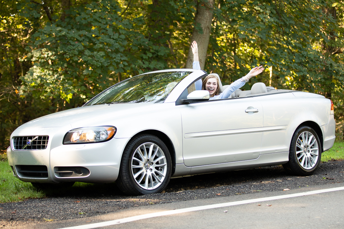 Senior pictures with convertible at Hartwood Acres Mansion