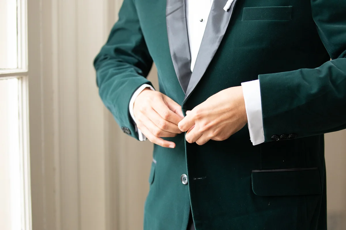 Groom getting ready for wedding ceremony.