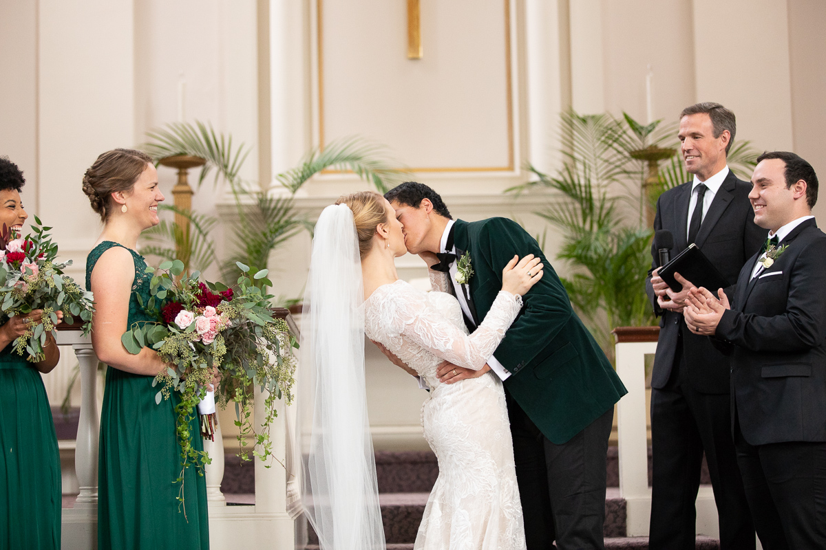 Bride and groom’s first kiss.