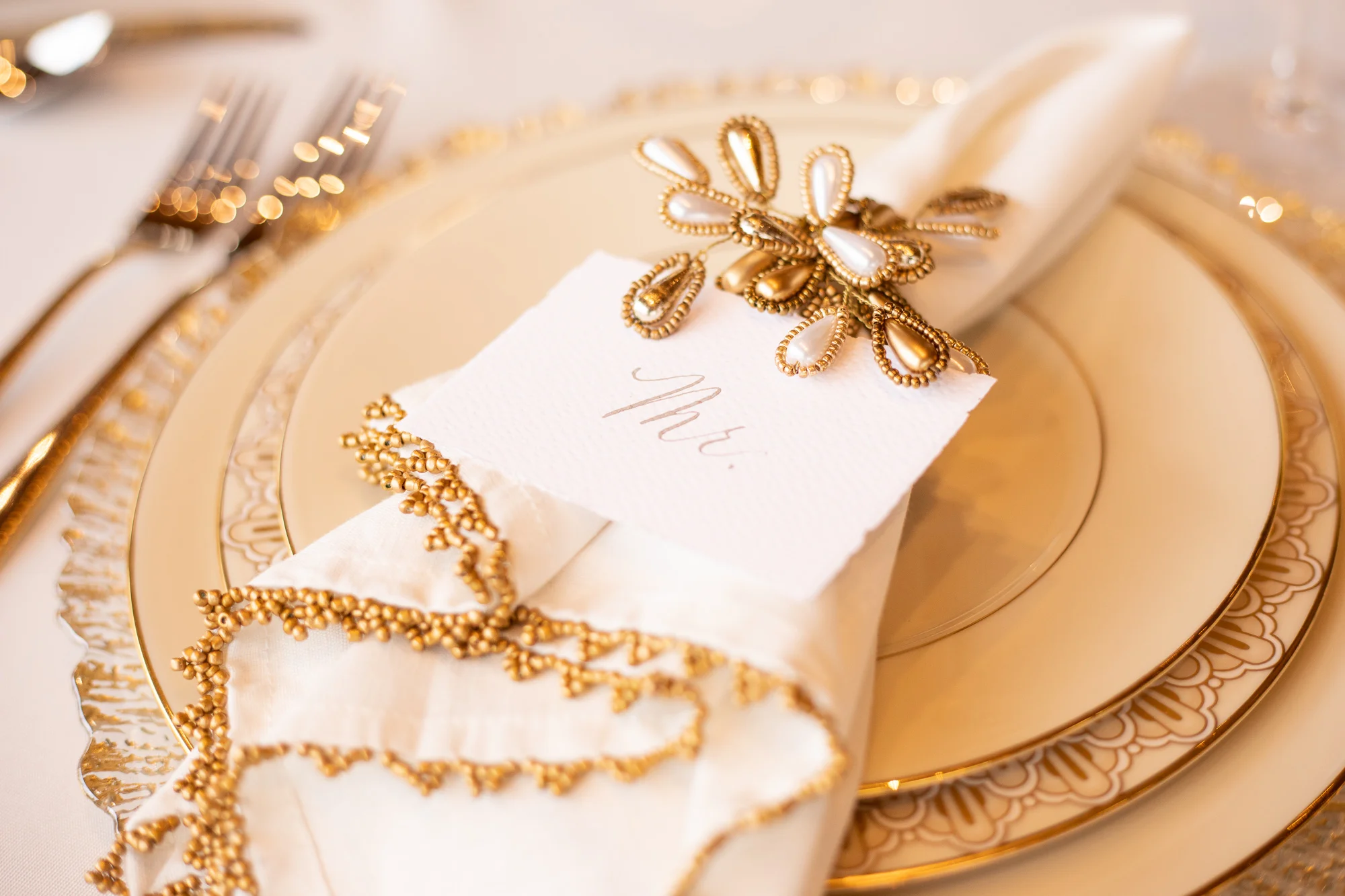 Wood & Grace place cards and Chelsea Party Center sweetheart table settings.