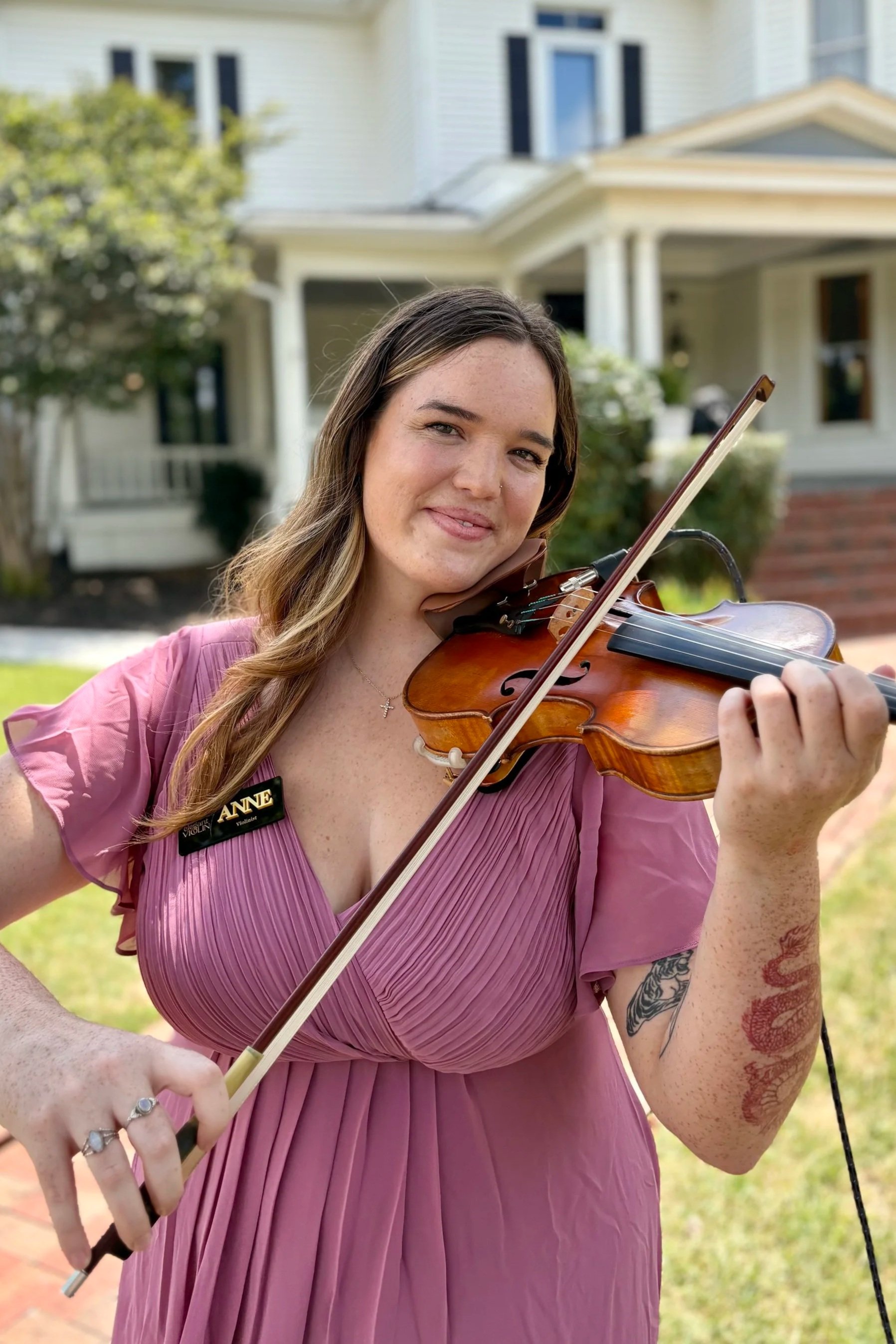 Elegant Violin Anne headshot at The Victorian Youngsville