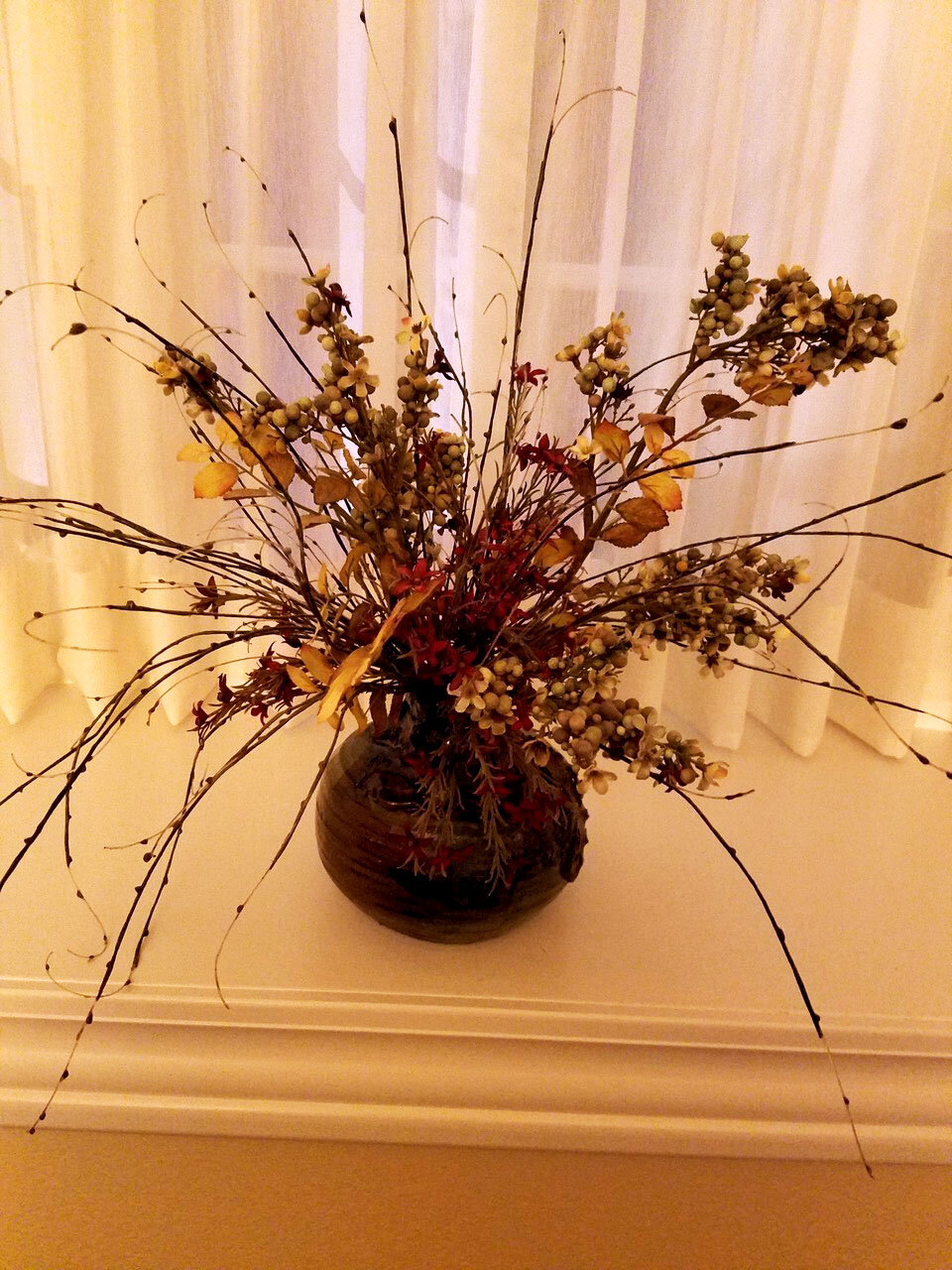  Judy’s floral arrangements really shine with fall leaves and warm colors! 