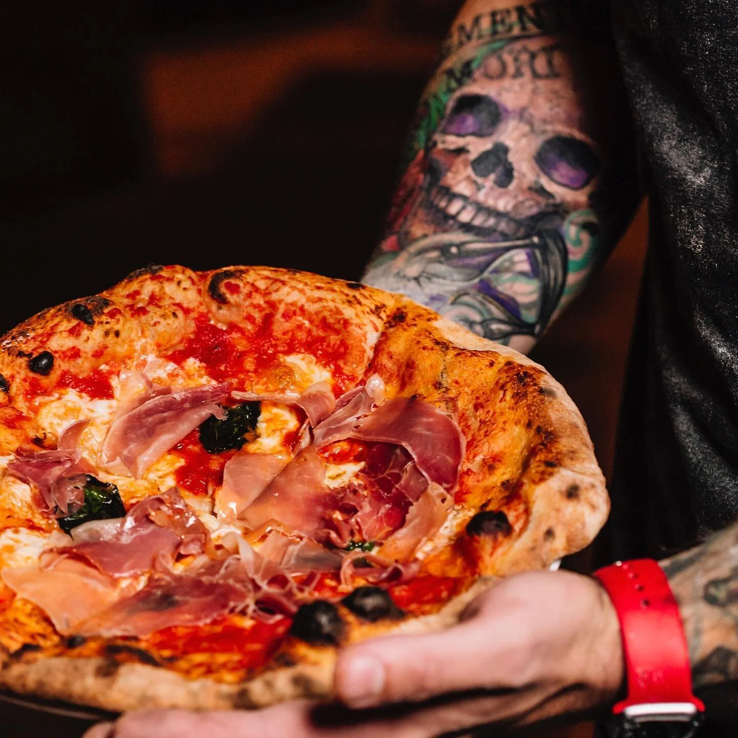 Handmade pizza at Casa Marana neighborhood bar