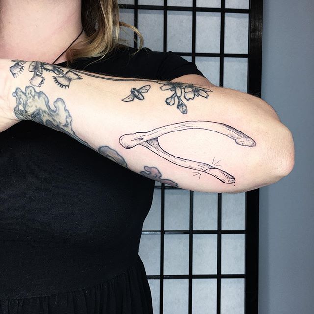 A wishbone from my flash for a friend and fellow apprentice. Thank you @kelsi_hooper for the love and trust and for being part of my wonderful tattoo family. It's an honor to keep the company of such strong, talented, kind, clever people. I don't kno