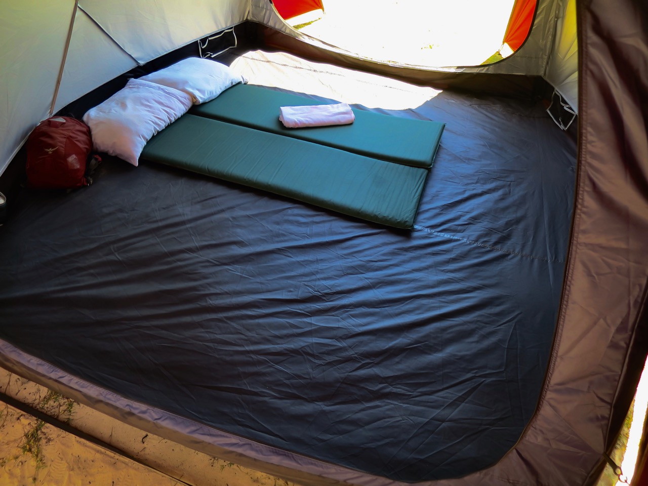10' x 9' Inner tent floor sleeps 6 people, or two with a king sized inflatable matress and room for your stuff