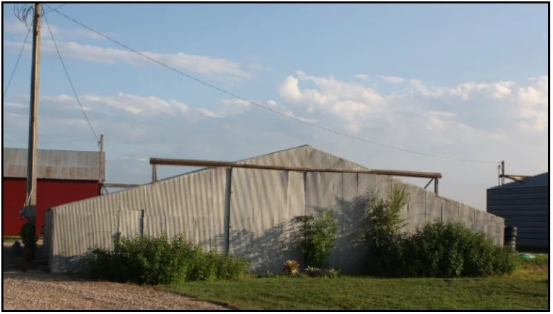 View of the pole machinery shed from the north side of the building.