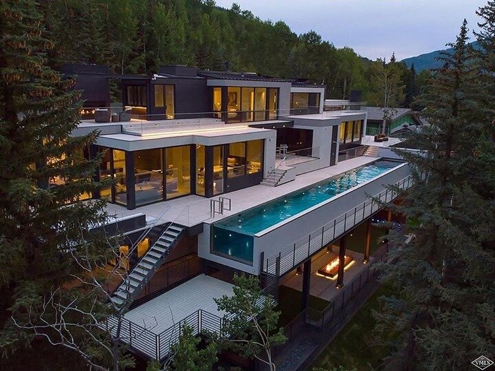 Mountain retreat. For a mere $45 million this could be yours. This home, located in Vail Colorado, has a 75-foot suspended glass bottom pool, freestanding elevator, 6,500 square feet of outdoor heated decks and bio-metric recognition entry. Just to n