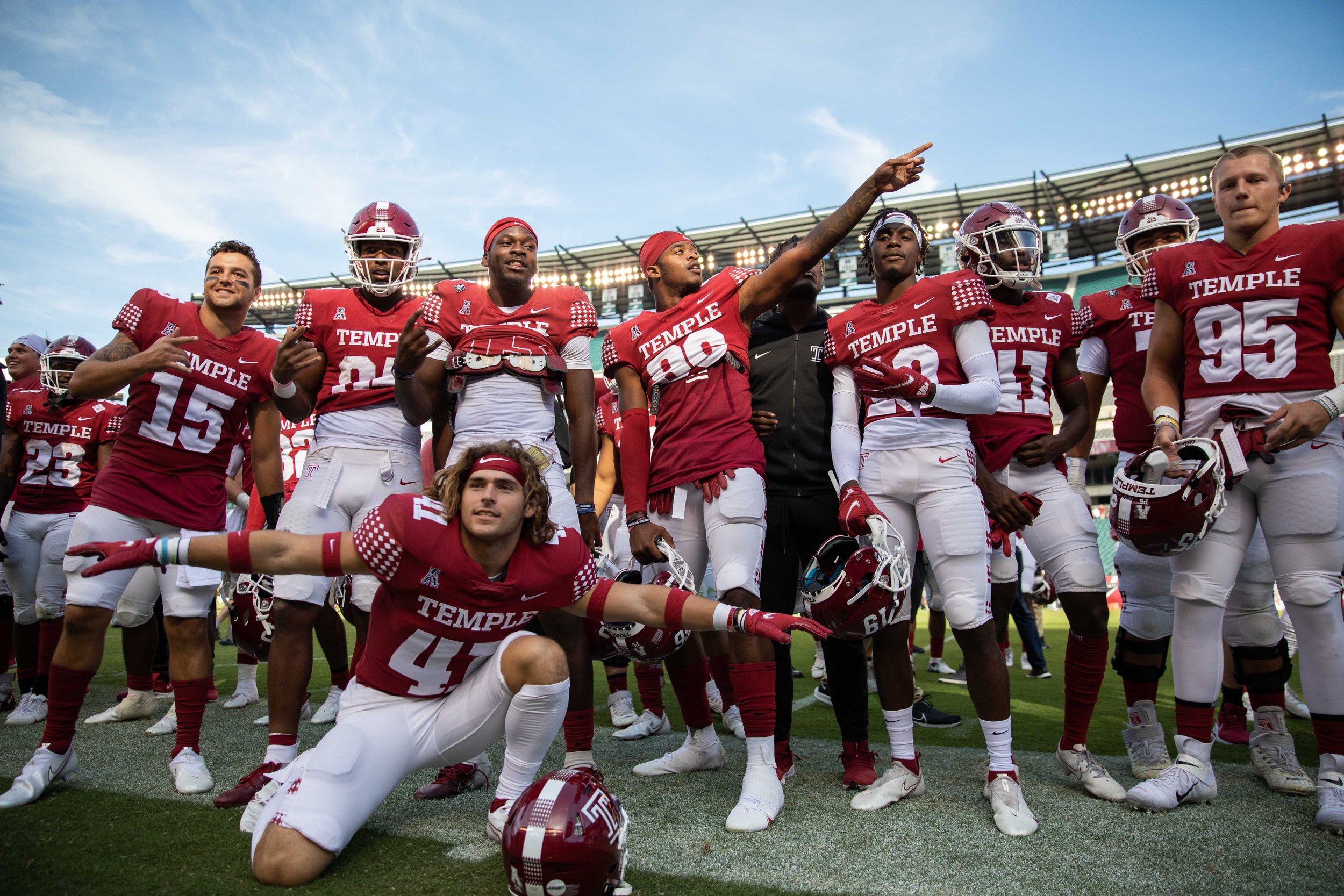   Part of the Temple Owls football team poses for a photo after their win during the homecoming game against the University of Memphis on Oct. 2, 2021.  