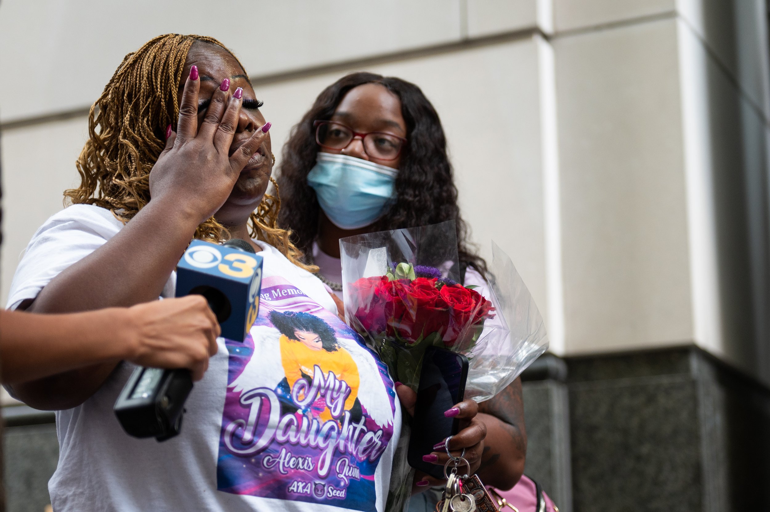   Tina Quinn (left) speaks with reporters outside the Juanita Kidd Scout Center for Criminal Justice after the preliminary hearing for three suspects involved in the shootings on South Street in Philadelphia on Wednesday, Sept. 7, 2022. Quinn's daugh