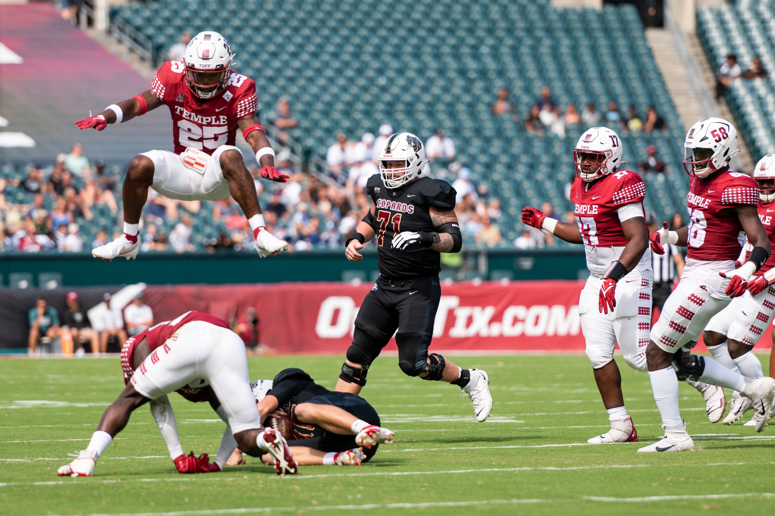   Alex Odom, safety for the Temple Owls, jumps out of the way of a tackle during the game against Lafayette College at Lincoln Financial Field on Saturday, Sept. 10, 2022. Temple won 30-14.  