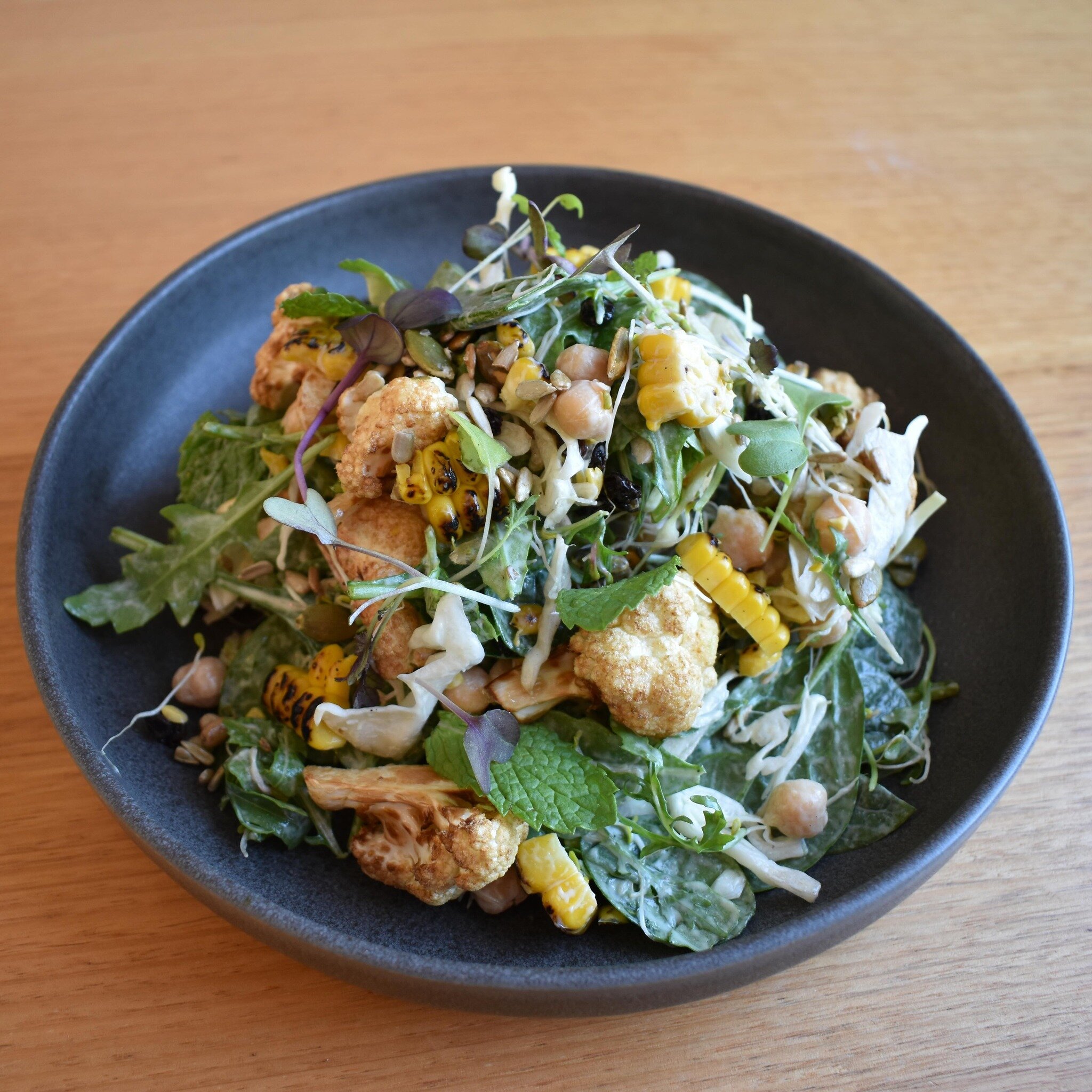 Cauliflower never looked so good! 😍

Our Crispy Cauliflower Salad is the ultimate feel good dish, featuring spinach, rocket, chickpeas, mint, alfalfa, charred corn, currents, green cabbage, toasted seeds and mustard dressing. 🥦

Orders yours today.