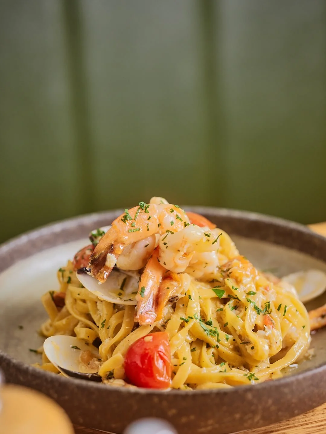 A hug in a bowl. Homemade pasta with garlic, chilli, cherry tomatoes, crab meat, prawns and vongole. If you haven&rsquo;t tried it yet you need to! We&rsquo;ll save you a seat 🤌🍝