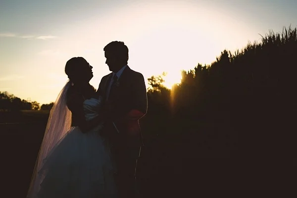 Gorgeous wedding portrait of the bride and groom at the magic hour