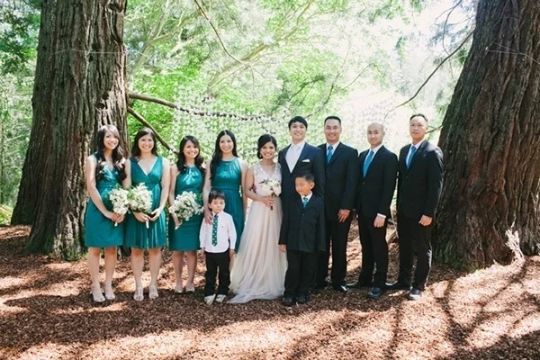 Bridesmaids and groomsmen in a romantic forest wedding