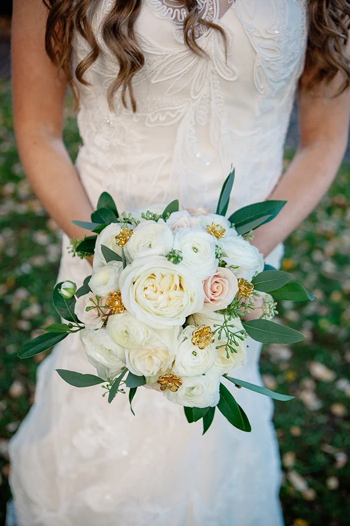 White, pink and gold wedding bouquet