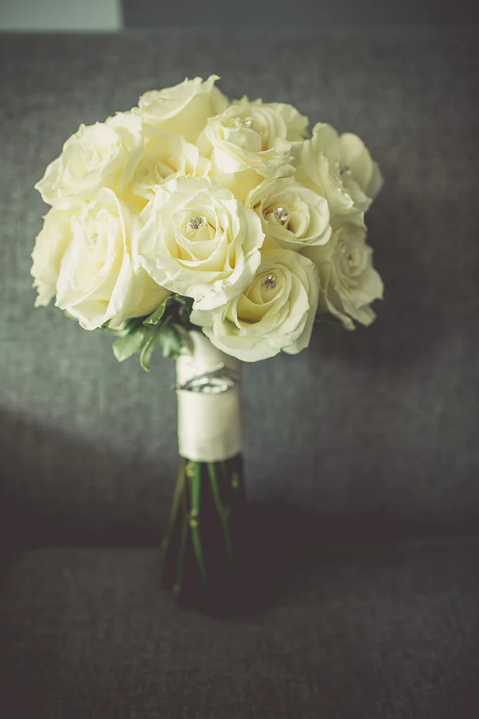 Classic white rose bouquet. So lovely!