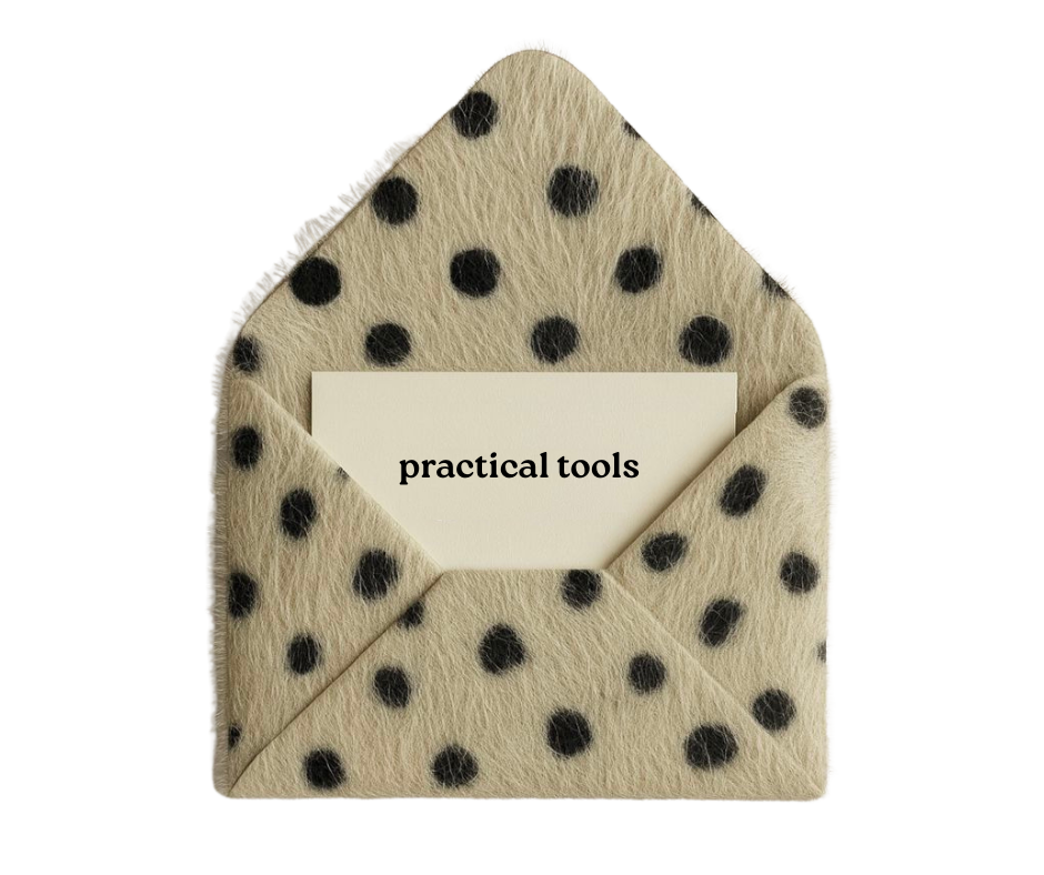 A cream-colored, polka-dotted fuzzy envelope holder with a card inside labeled "practical tools".