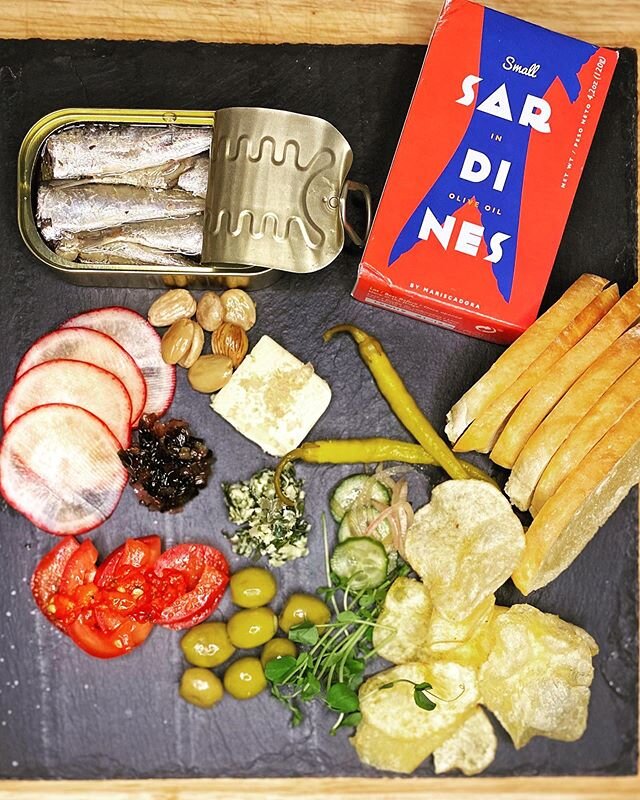 A #tinnedfish plate. Inspired by reminiscing about Barcelona, needing a fancy lunch, and have way to many condiments in my fridge. Unexpected favorite combo was butter, tomato, Calabrian chile, sardine on crunchy bread #fancylunch #eatmoretinnedfish