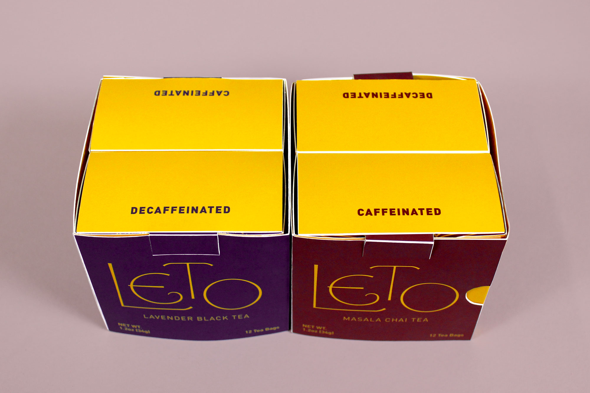 The box is divided into two compartments, separating the caffeinated and decaffeinated teas.