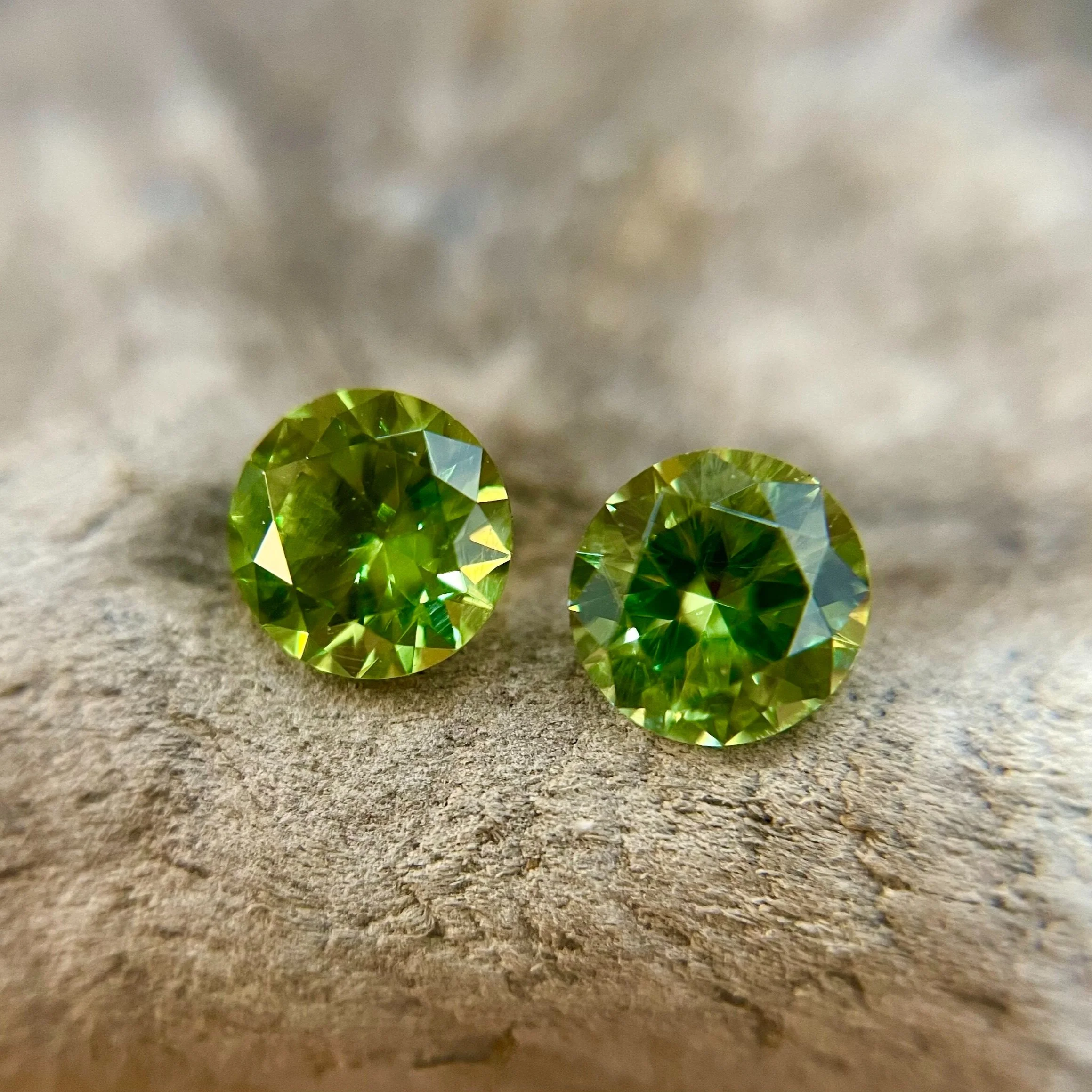 demantoid green garnets pair gemstones gem cutting london
