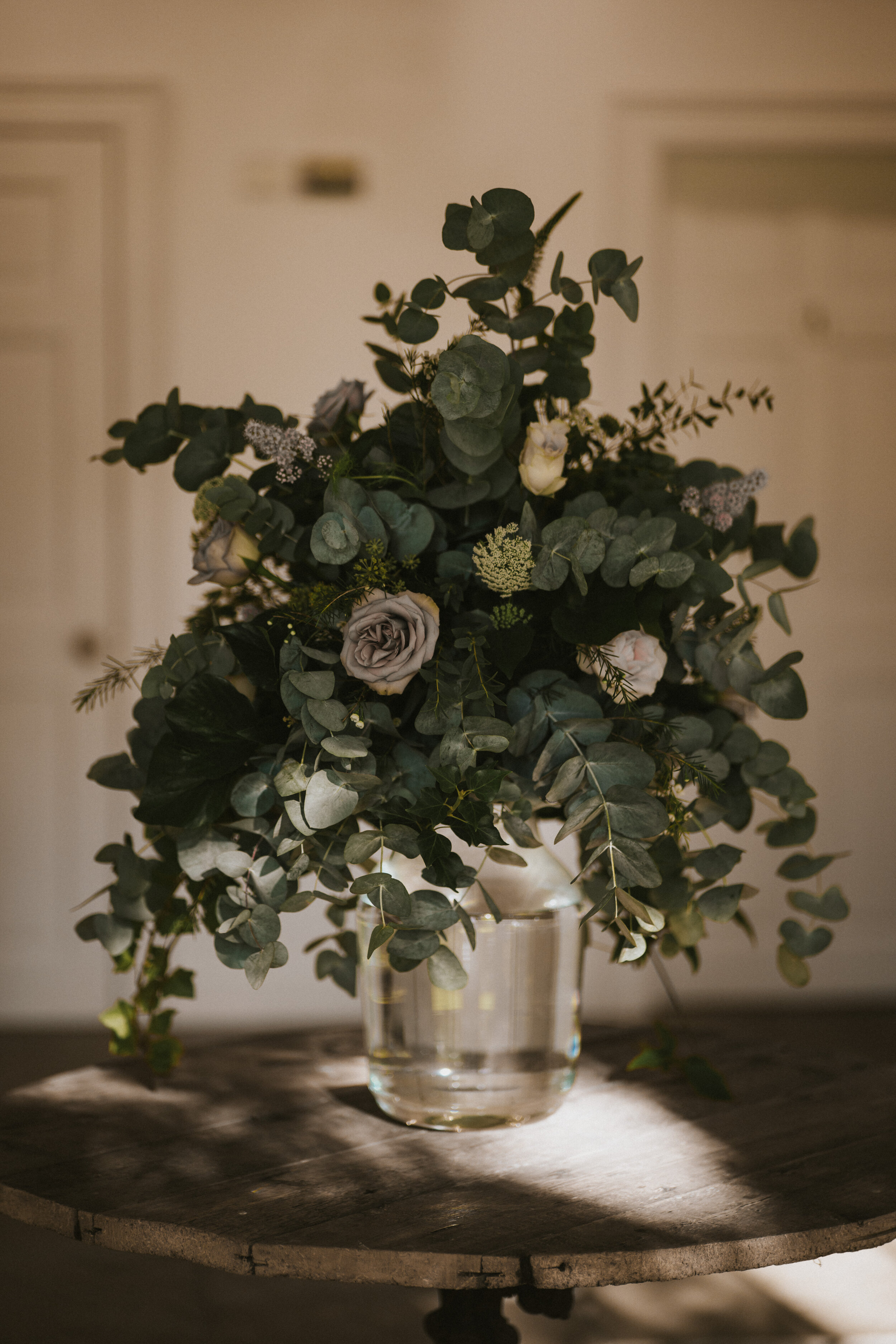  Large foliage and floral table centrepiece by All Bunched Up Florist at Aswarby Rectory, Sleaford. 