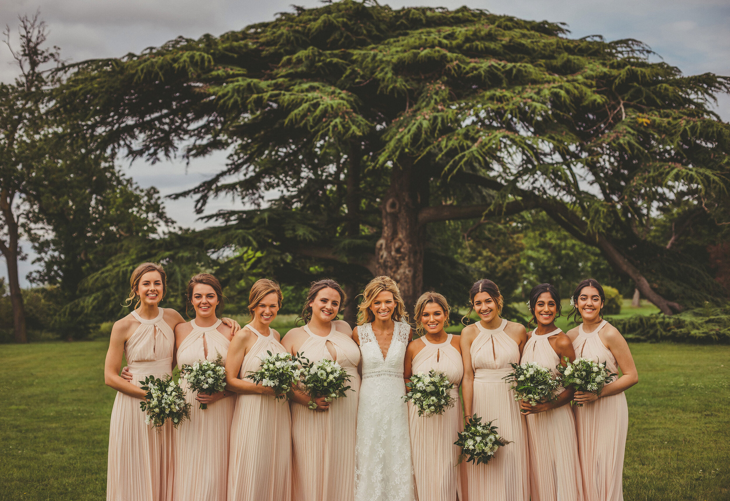  Bride and Bridesmaids with floral bouquets by All Bunched Up in the grounds of wedding venue Stubton Hall, Newark. 