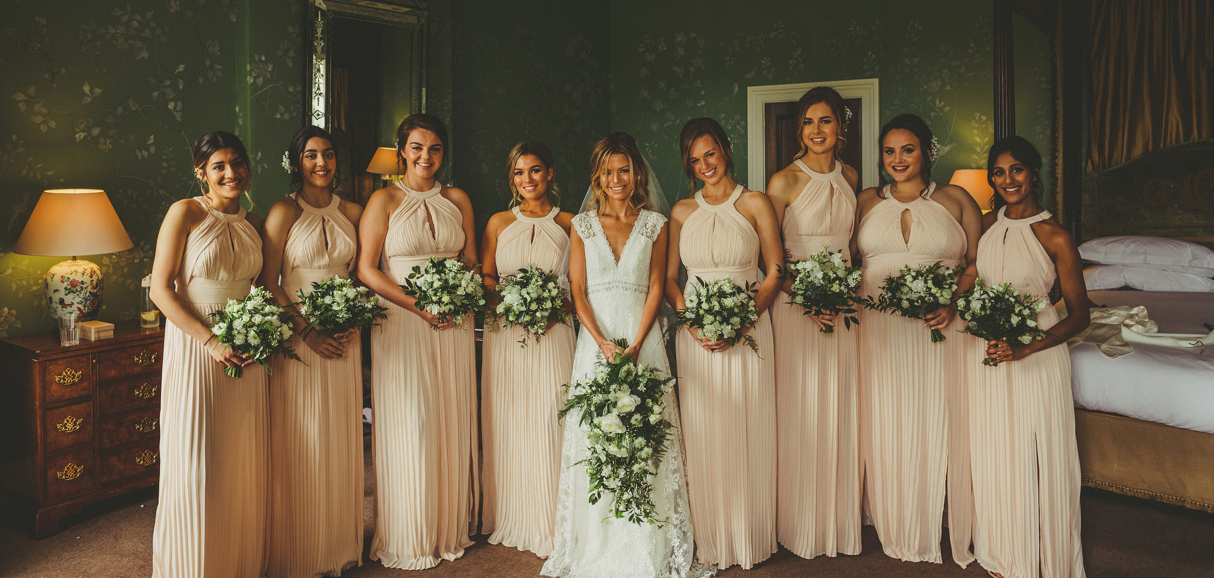  Bride and Bridesmaids pose for a photo before the ceremony with their wedding bouquets by All Bunched Up, at Stubton Hall, Newark, Nottinghamshire. 