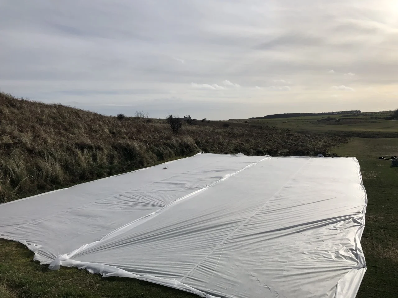 Grow mats over the 8th Tee - your going to see a few of these out on the golf course to help try and promote some new grow on heavily worn areas.