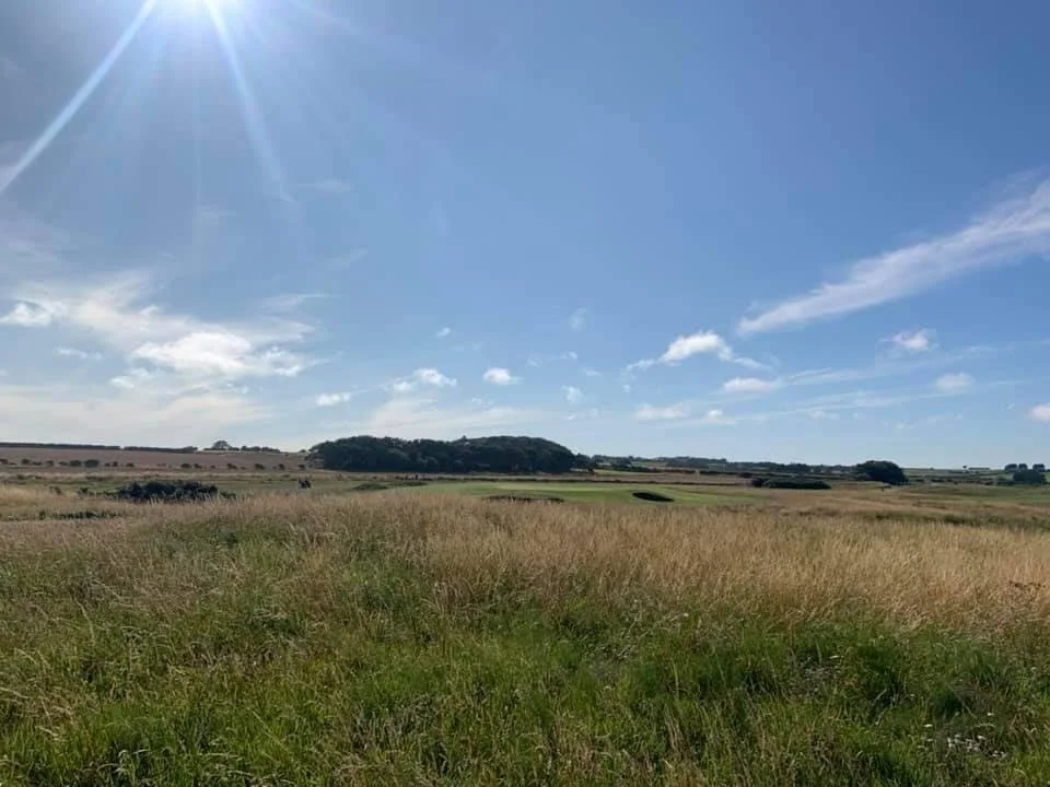Links fairway running out towards the sea