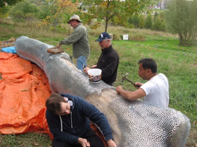 Participating symposium artists lend artist Paul Griffin a much needed helping hand as last hours of symposium wind down. Thanks Guys!