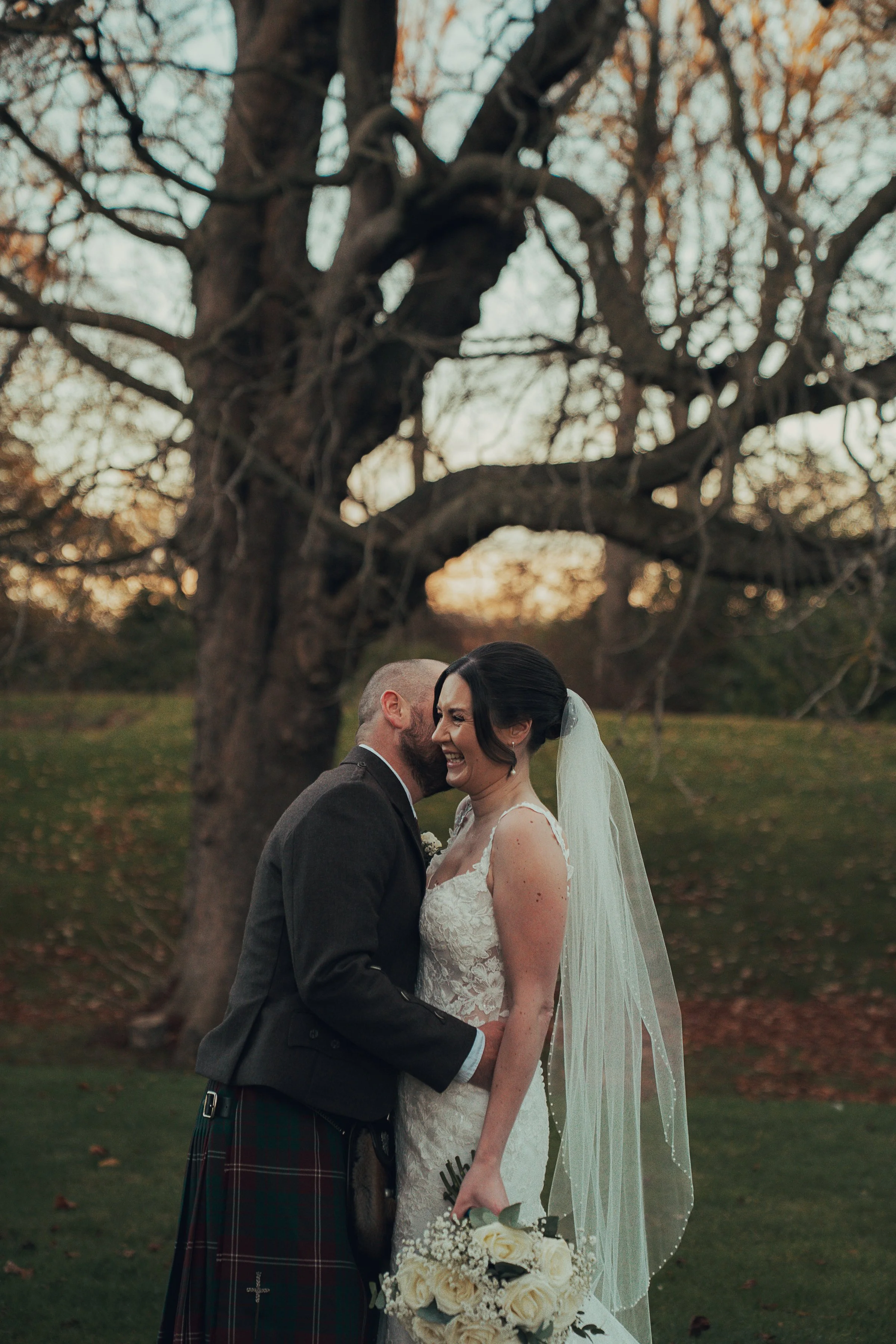 candid-wedding-couple-laughing-norton-house.jpg