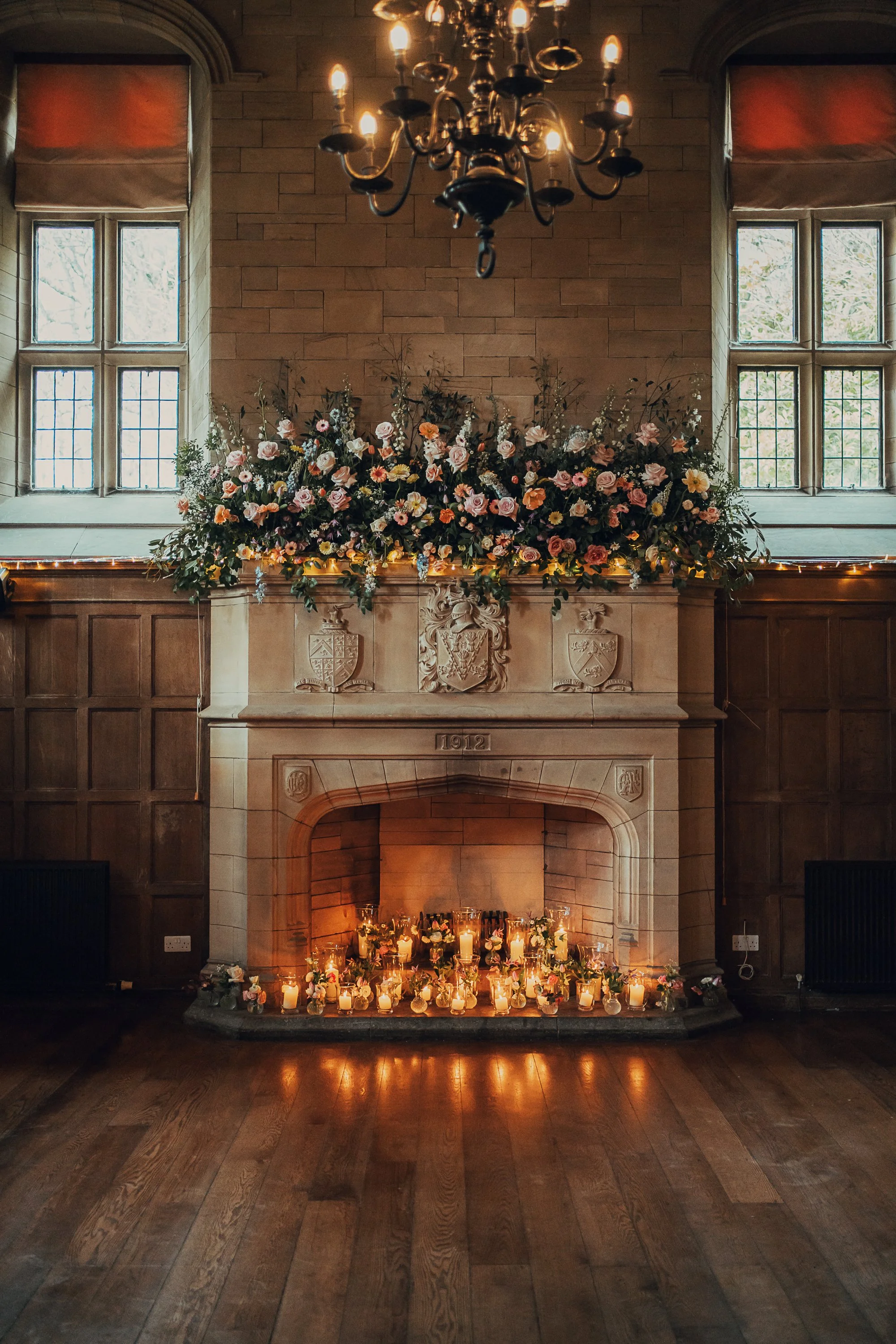 achnagairn-ballroom-fireplace-wedding-flowers-candles.jpg