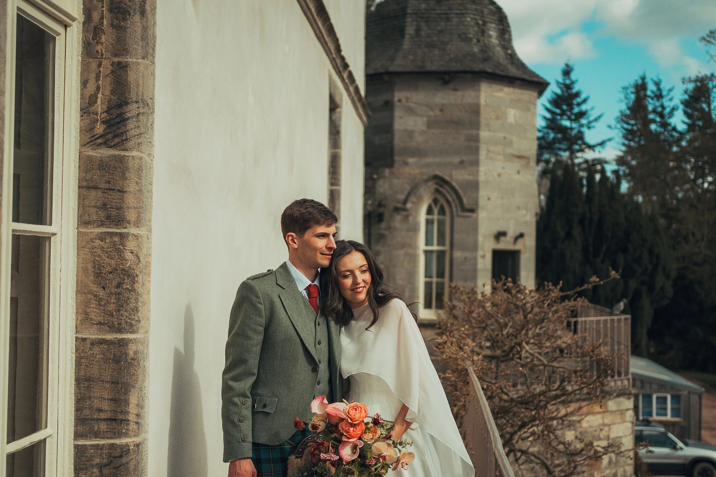 couple-outside-winton-castle-wedding.jpg