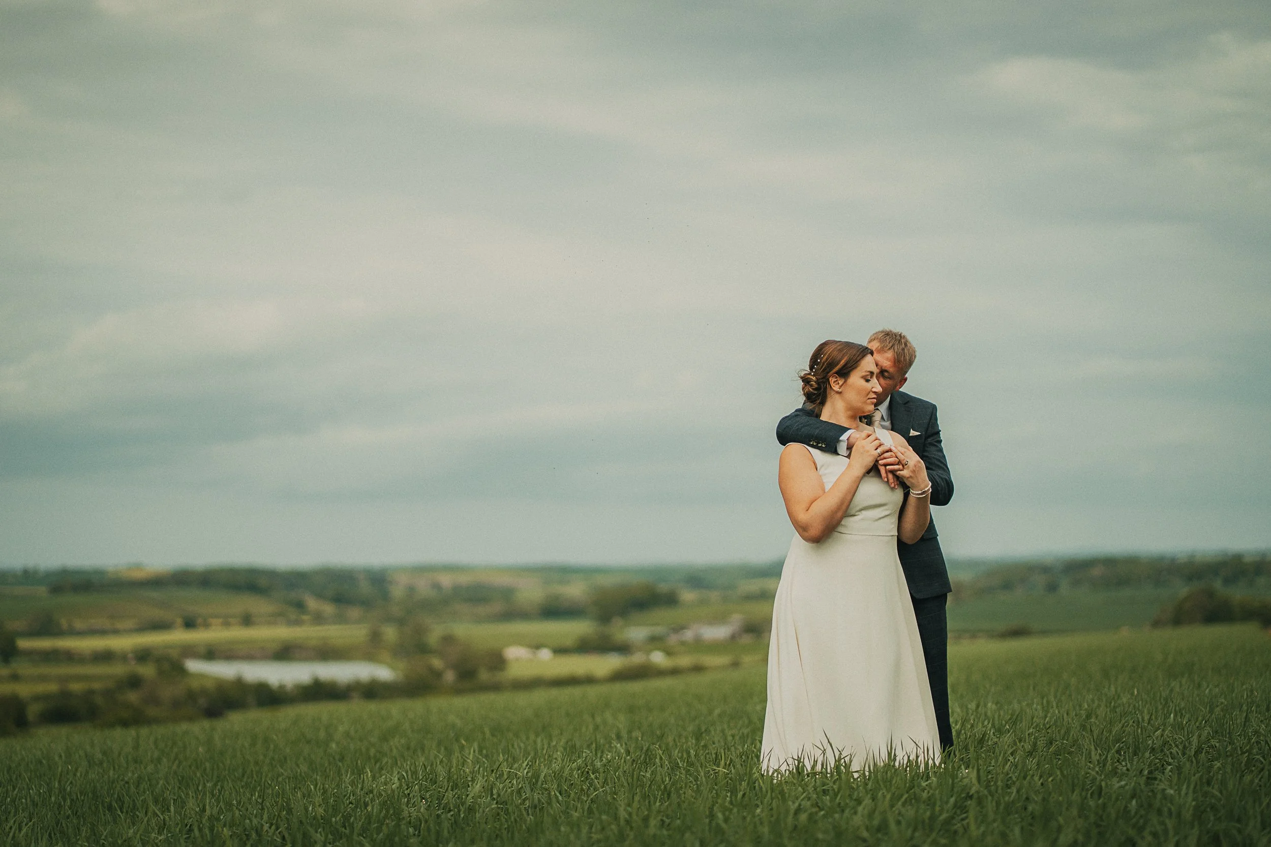 couple-portrait-field-scottish-borders-wedding.jpg