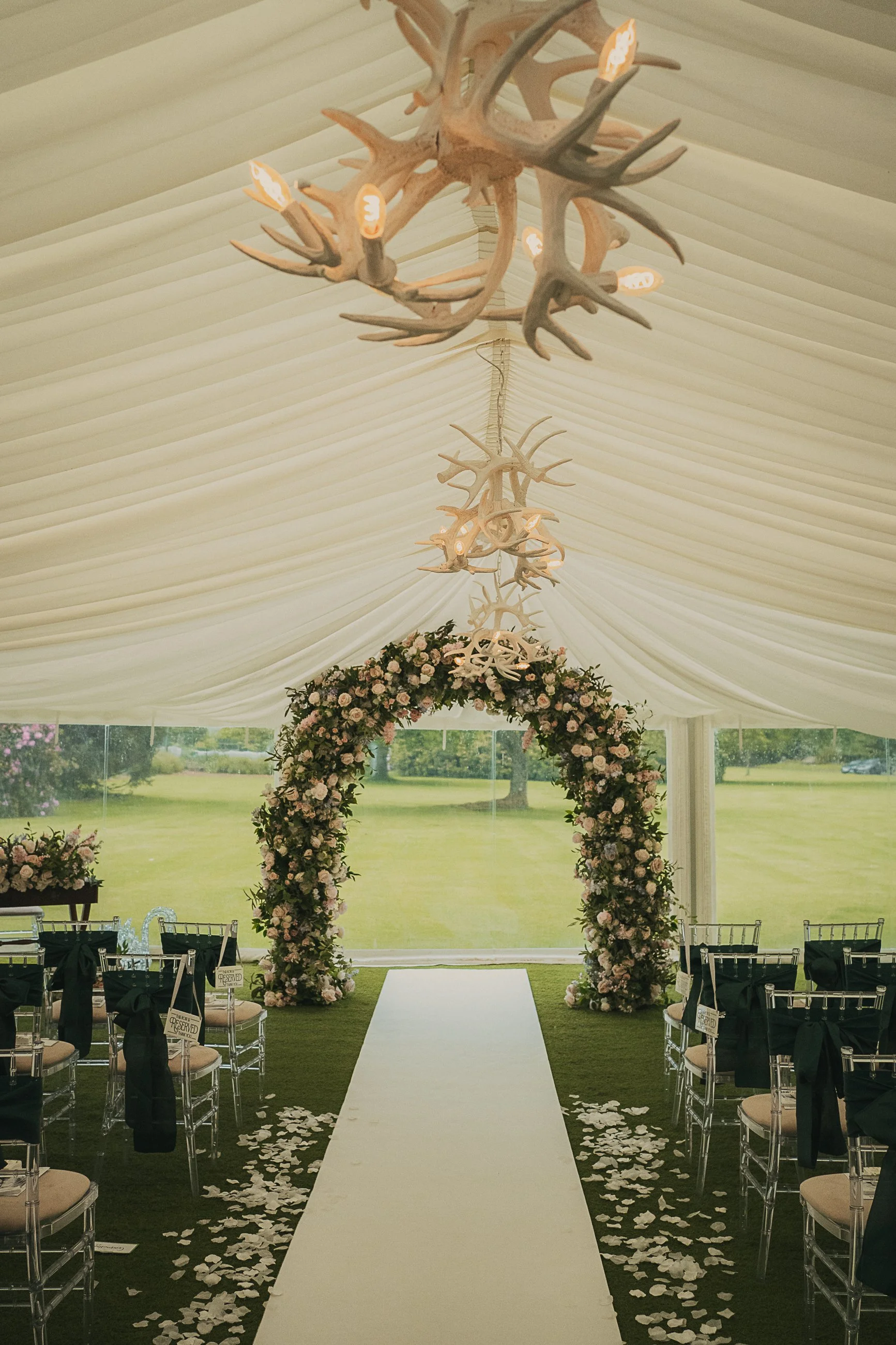 shona-john-walk-down-aisle-flower-arch-dunkeld-house-hotel.jpg