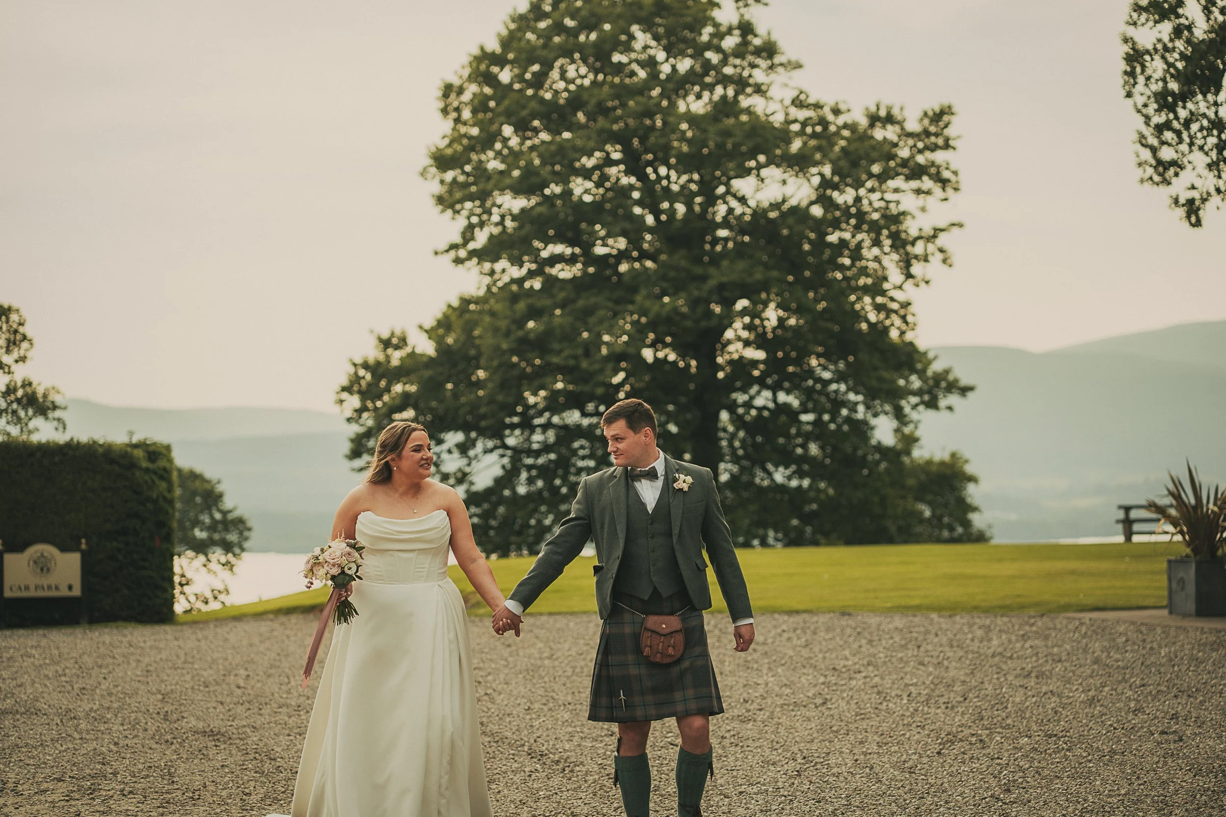 boturich-castle-couple-walking-loch-lomond.jpg